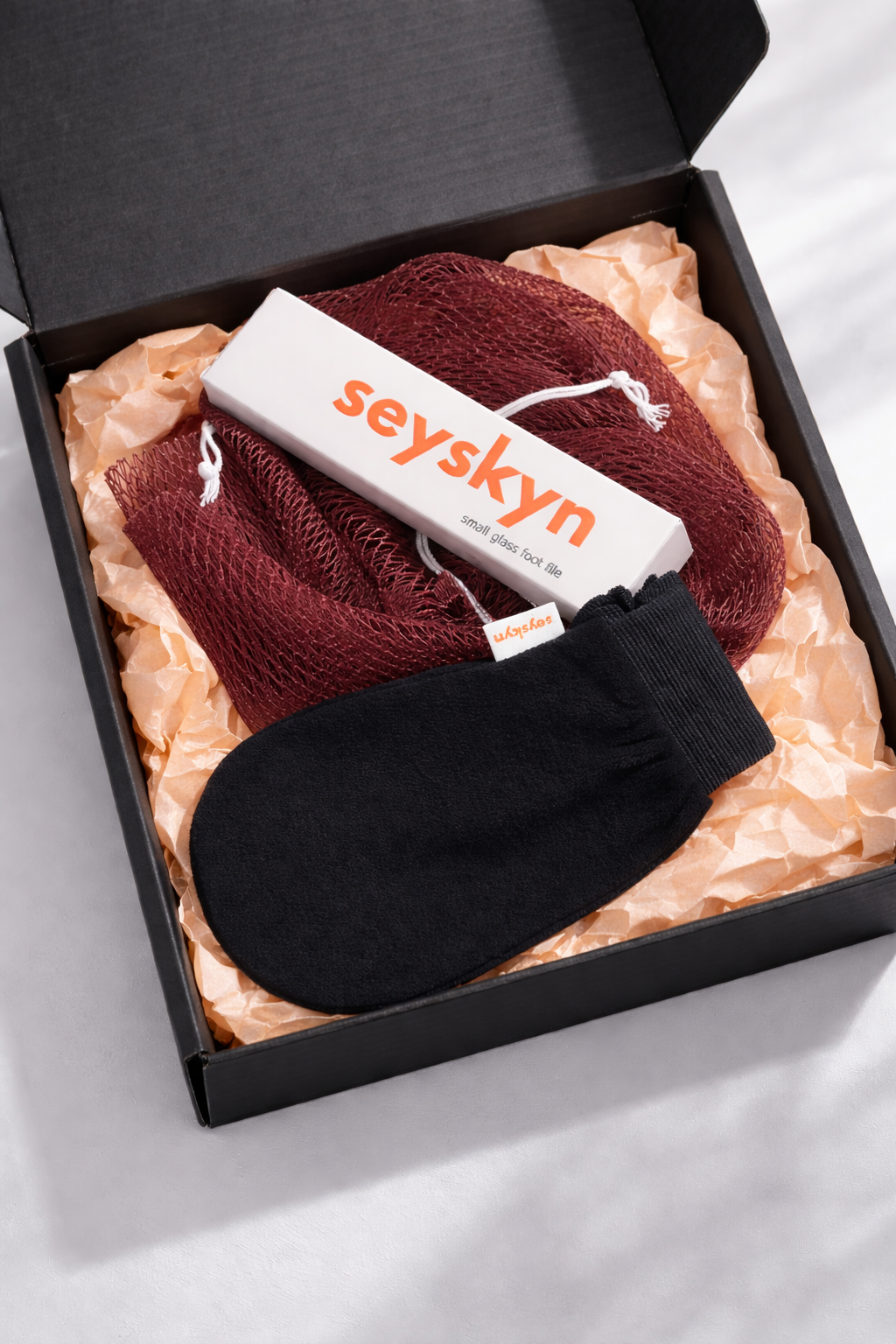 foot file, exfoliation mitt and african net sponge